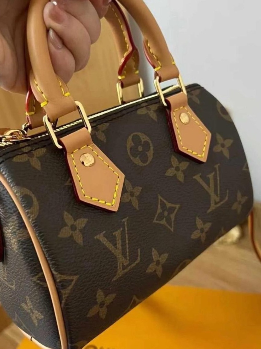 Louis Vuitton Speedy Bandouliere 25 Monogram Satchel in Brown